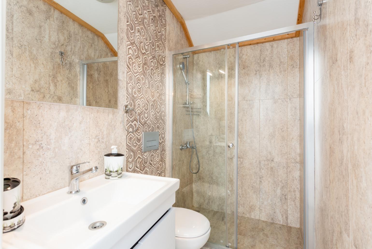 En suite bathroom with shower