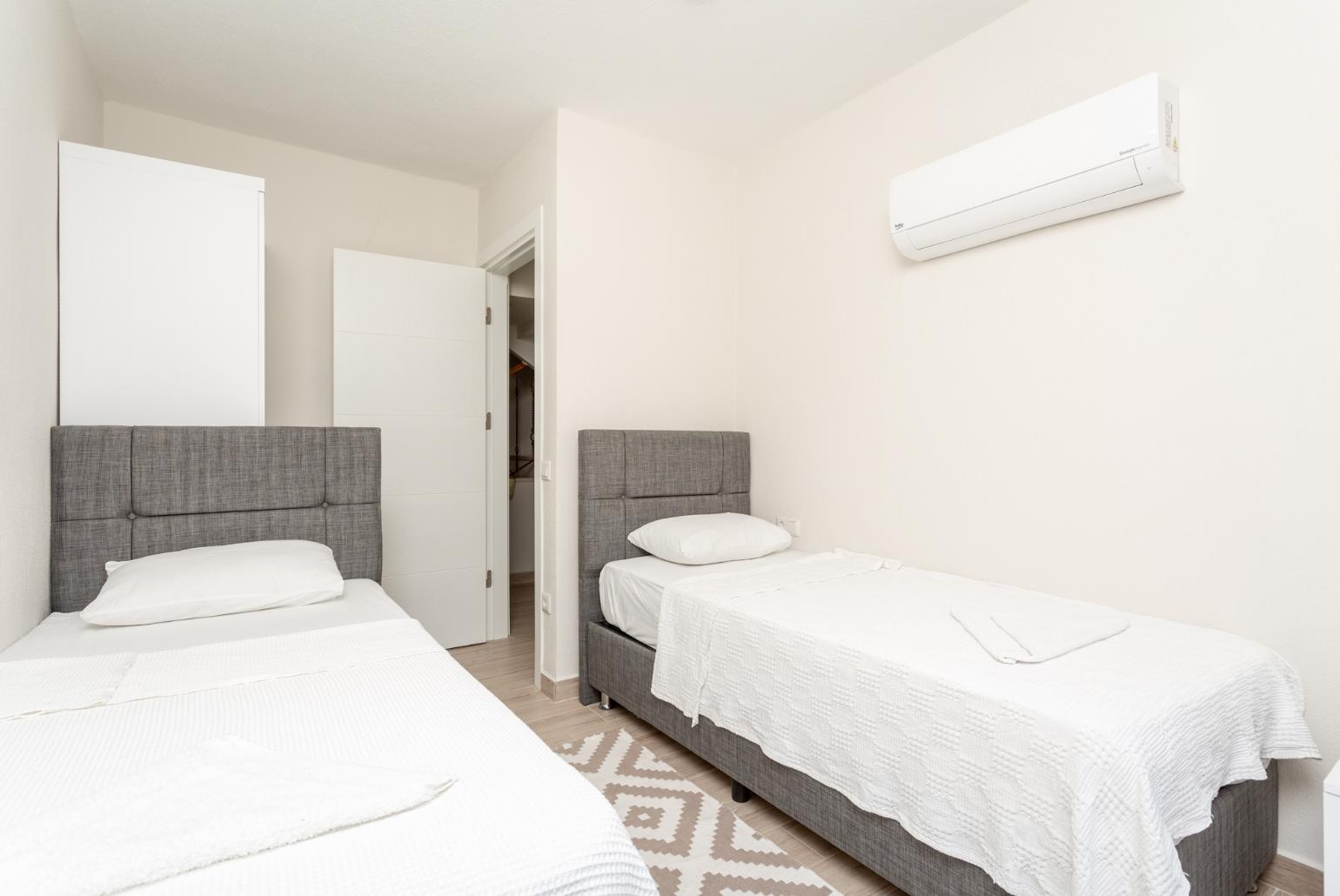 Twin bedroom with A/C and pool terrace access