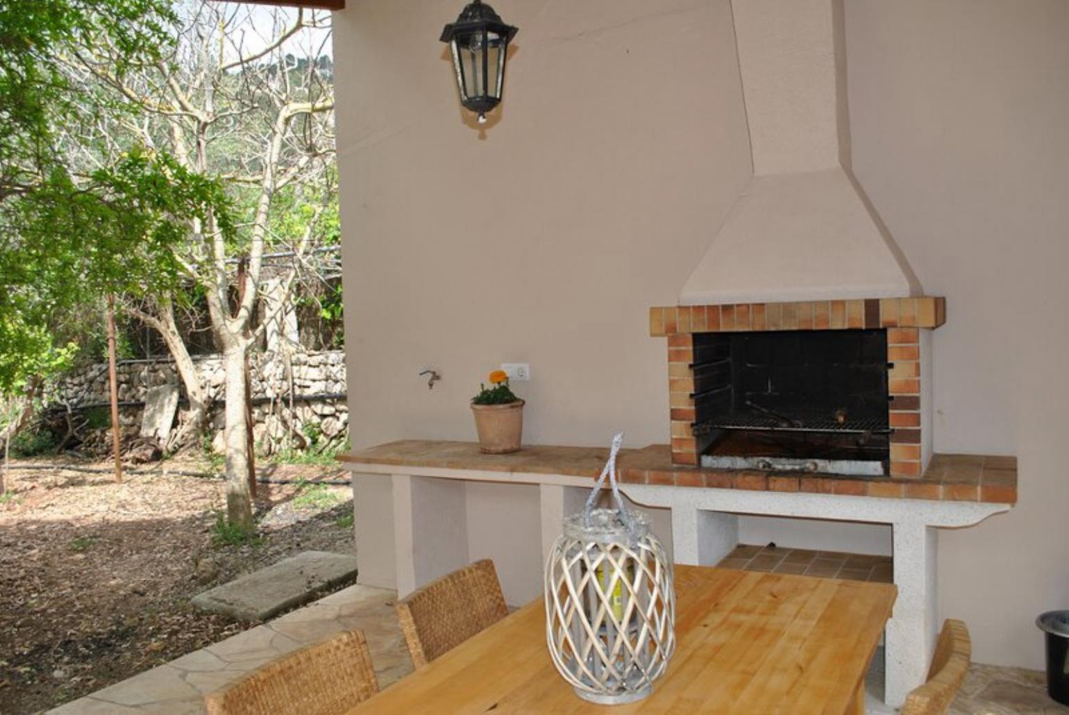 Sheltered terrace area with BBQ