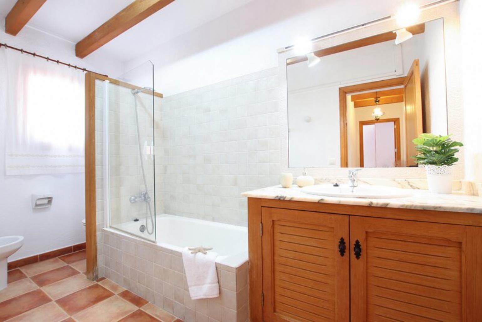 Family bathroom with bath and shower