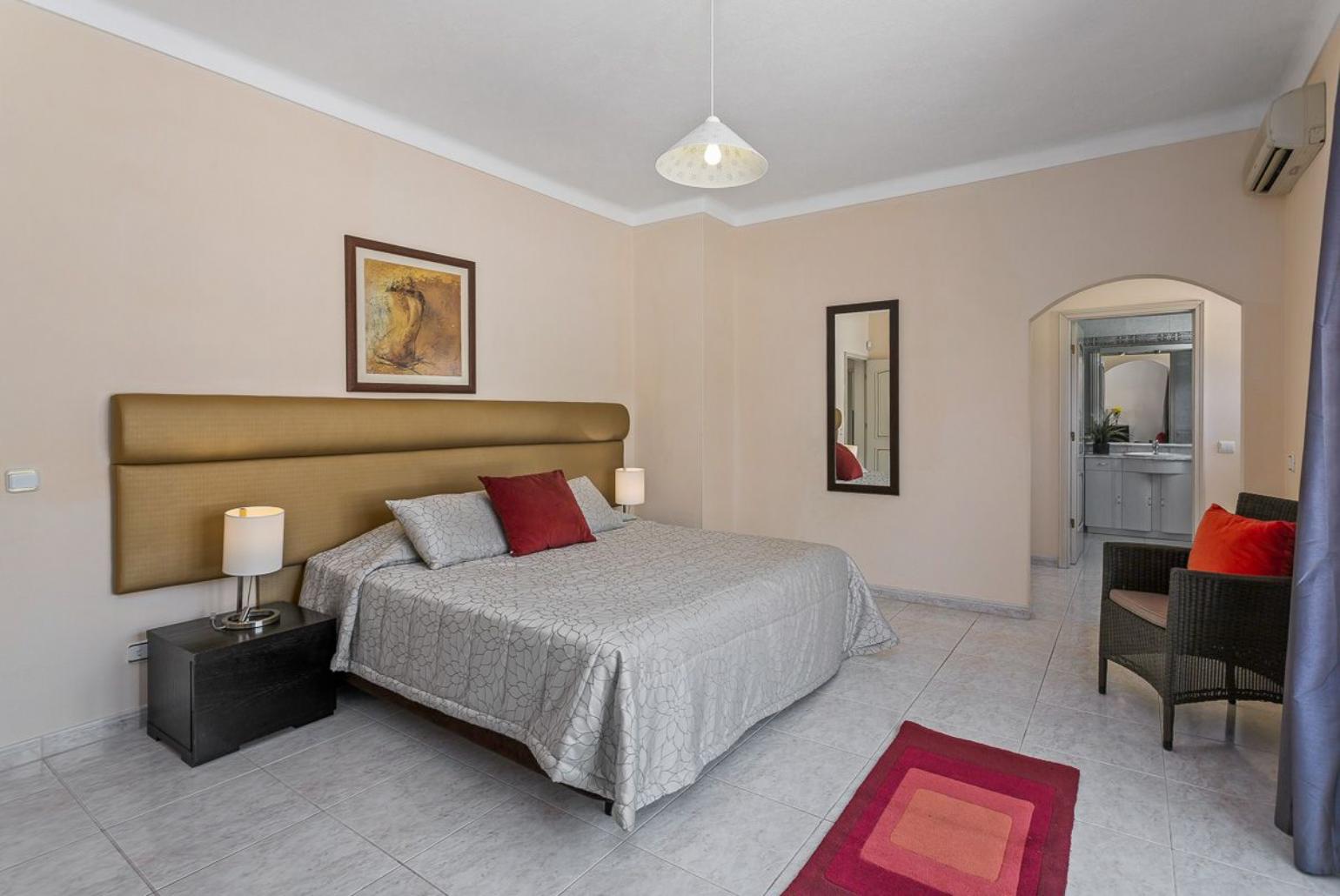 Double bedroom with AC and en-suite bathroom.