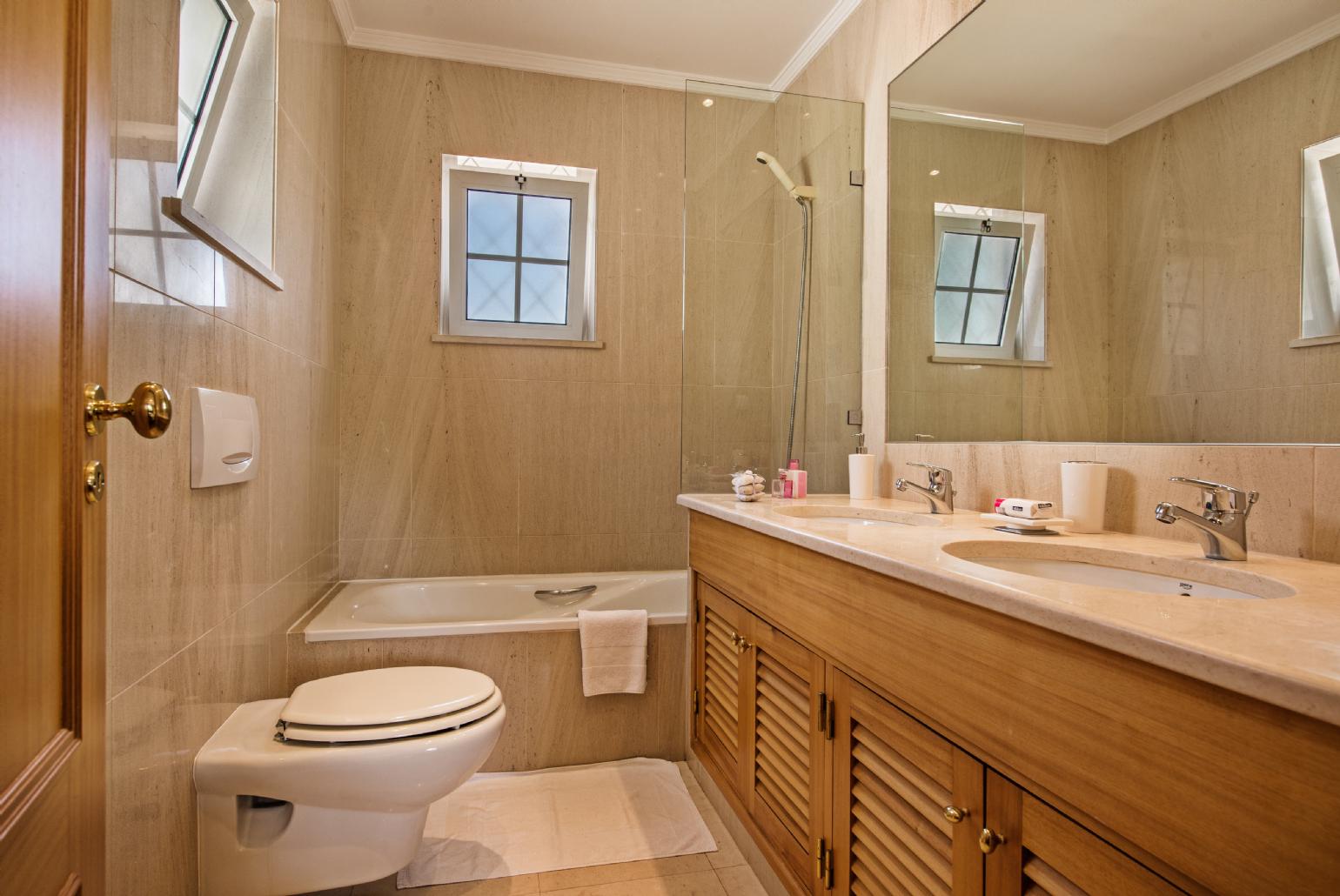 Bathroom with bathtub.