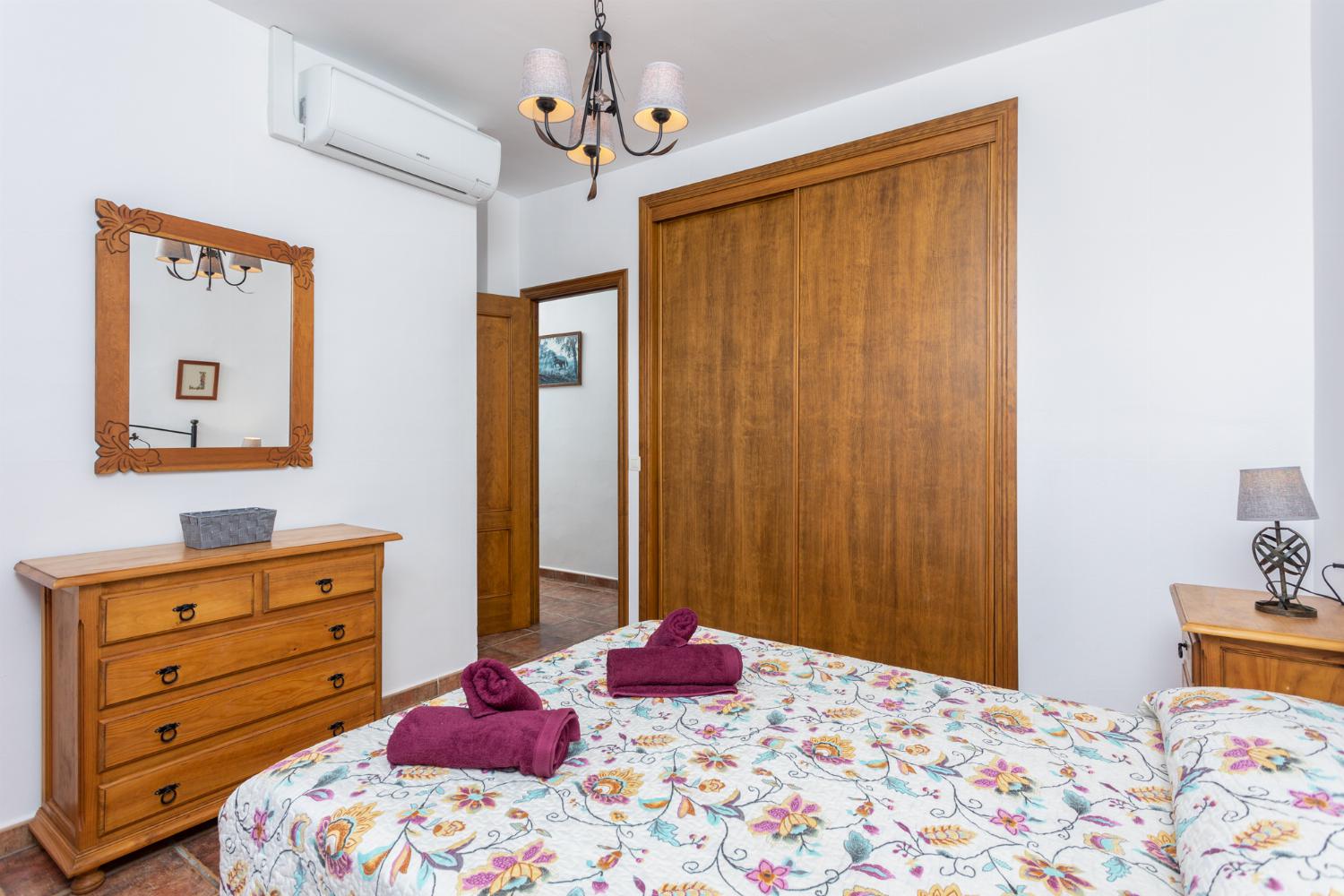 Double bedroom with en suite bathroom and A/C