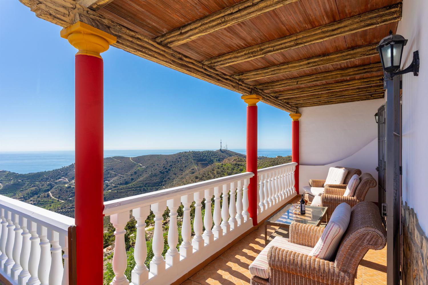 Sheltered terrace area with sea views