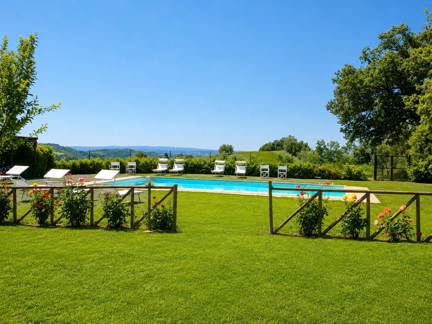 Private pool, terrace, and garden with countryside views