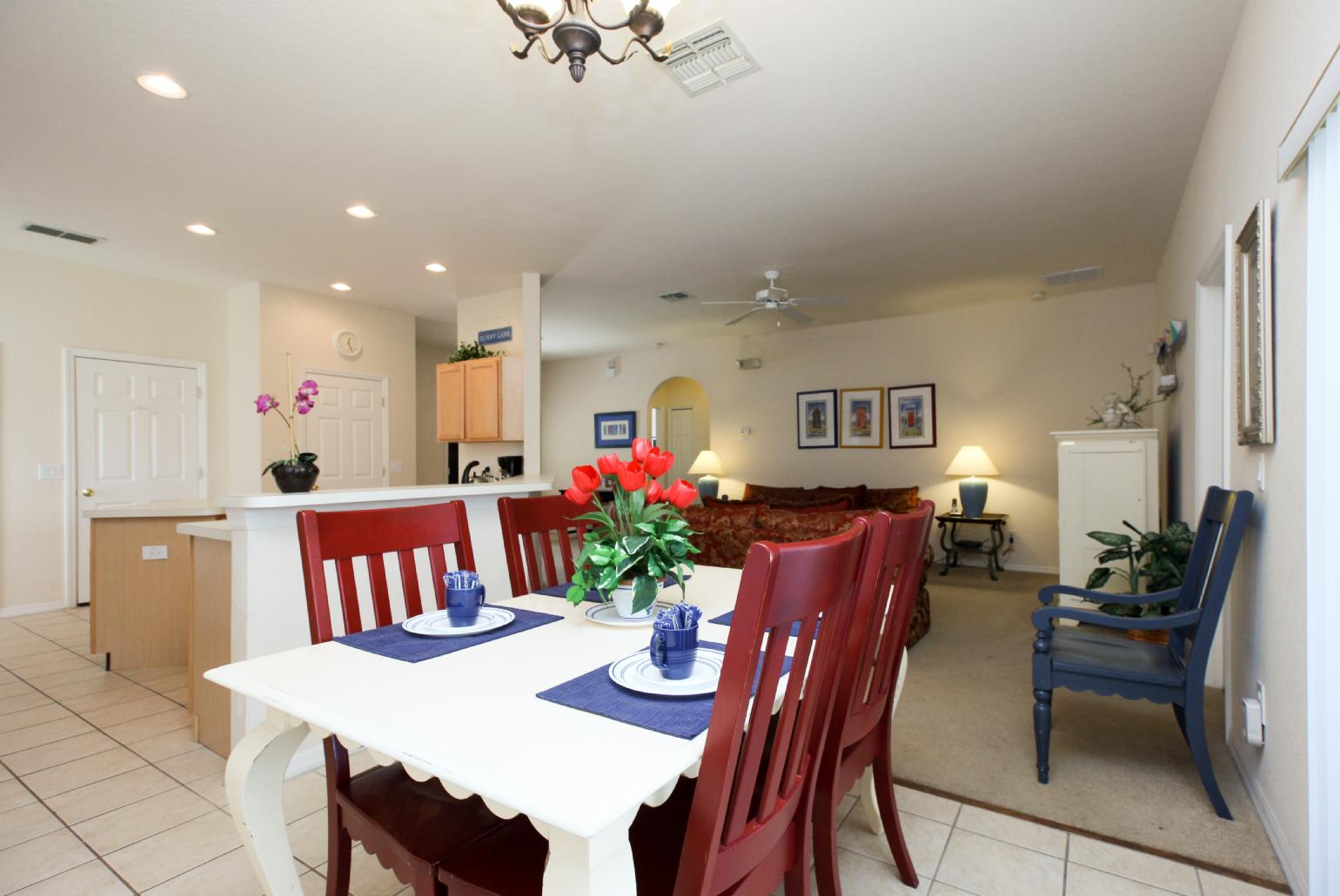 Open-plan living room with dining area and kitchen.