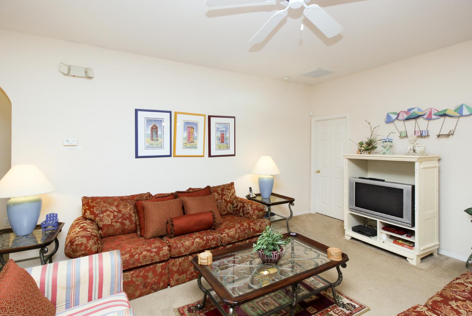 Open-plan living room with dining area and kitchen.