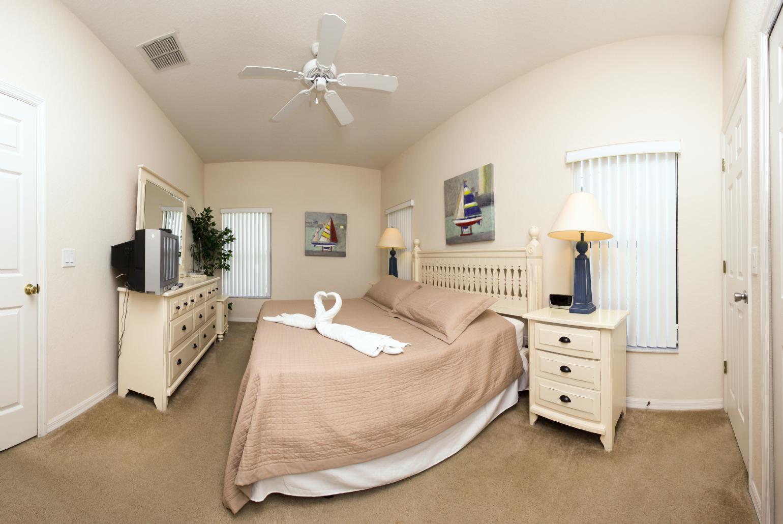 Double bedroom with TV.