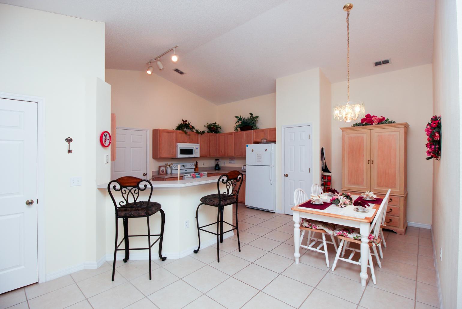 Open-plan living room with dining area and kitchen.