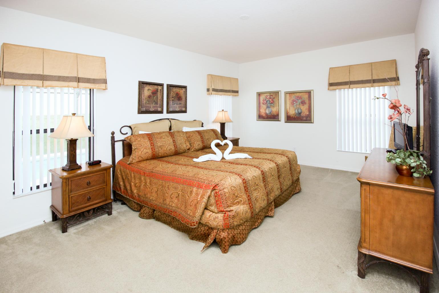 Double bedroom with TV.