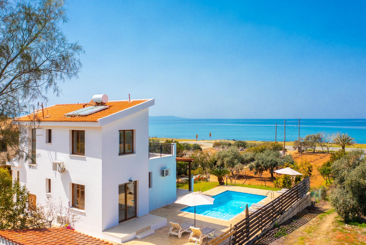 ,Beautiful villa with private pool, terrace, and garden with panoramic sea views