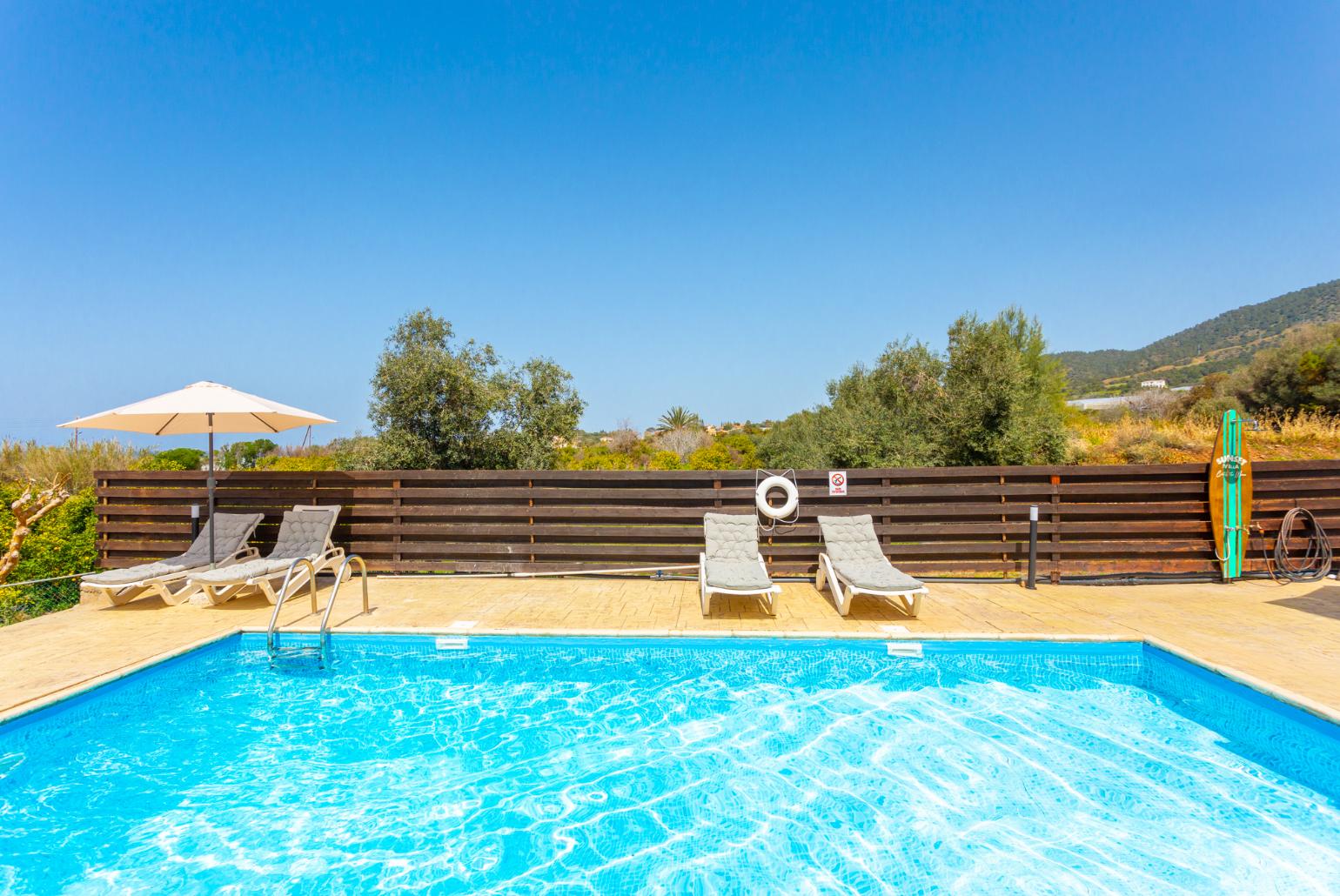 Private pool, terrace, and garden with panoramic sea views