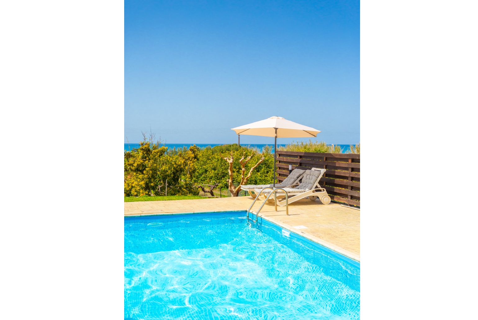 Private pool, terrace, and garden with panoramic sea views