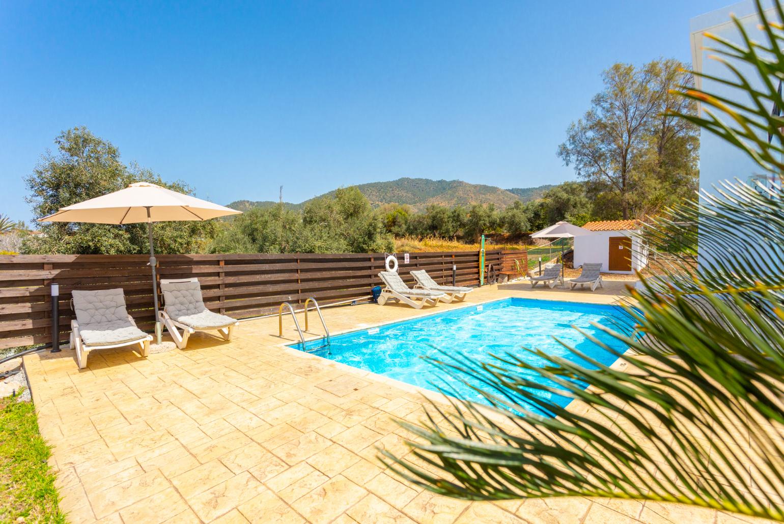 Private pool, terrace, and garden with panoramic sea views