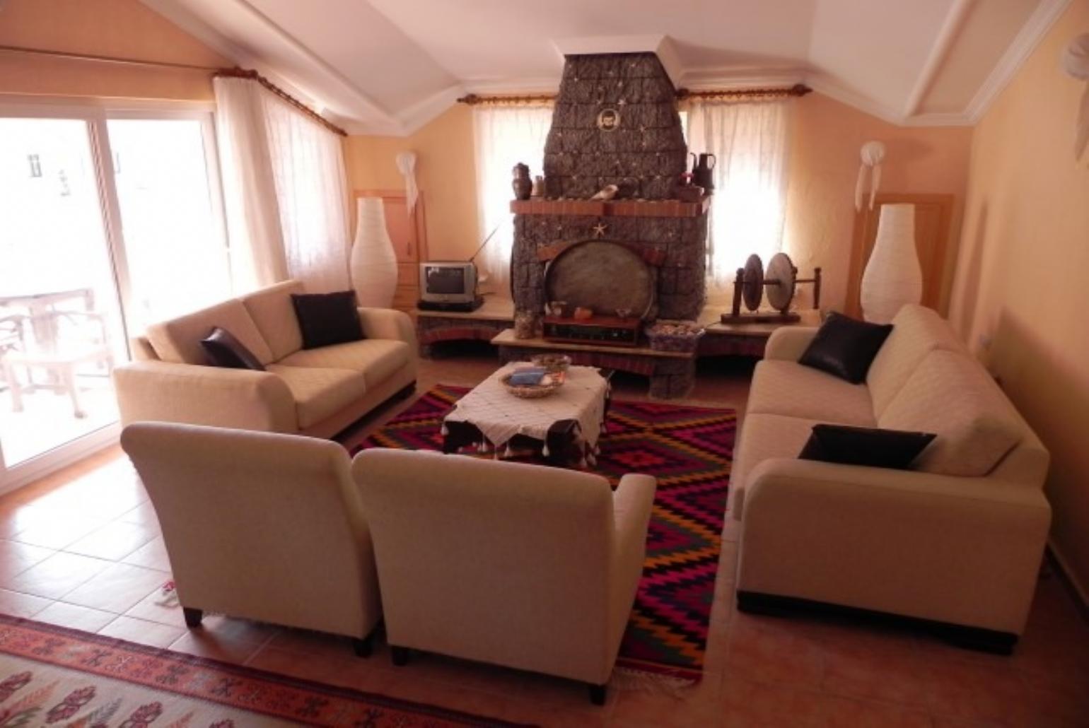 Living room with ornamental fireplace