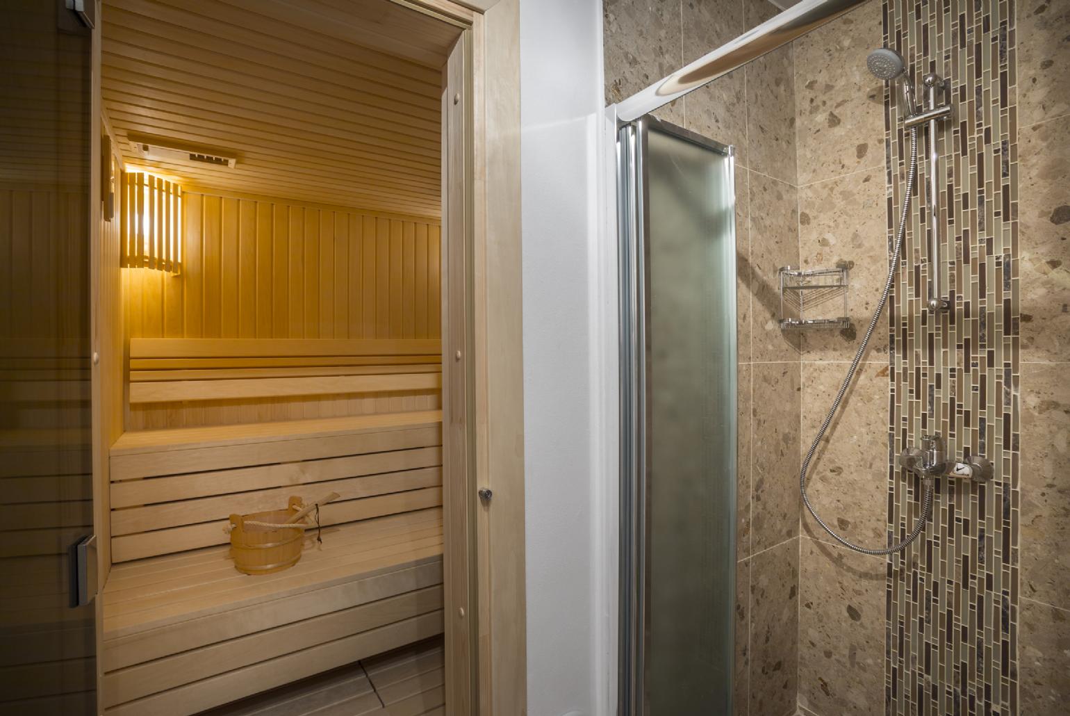 Bathroom with shower and sauna