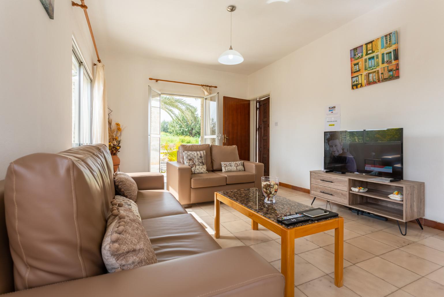 Living room with sofas, WiFi internet, and satellite TV