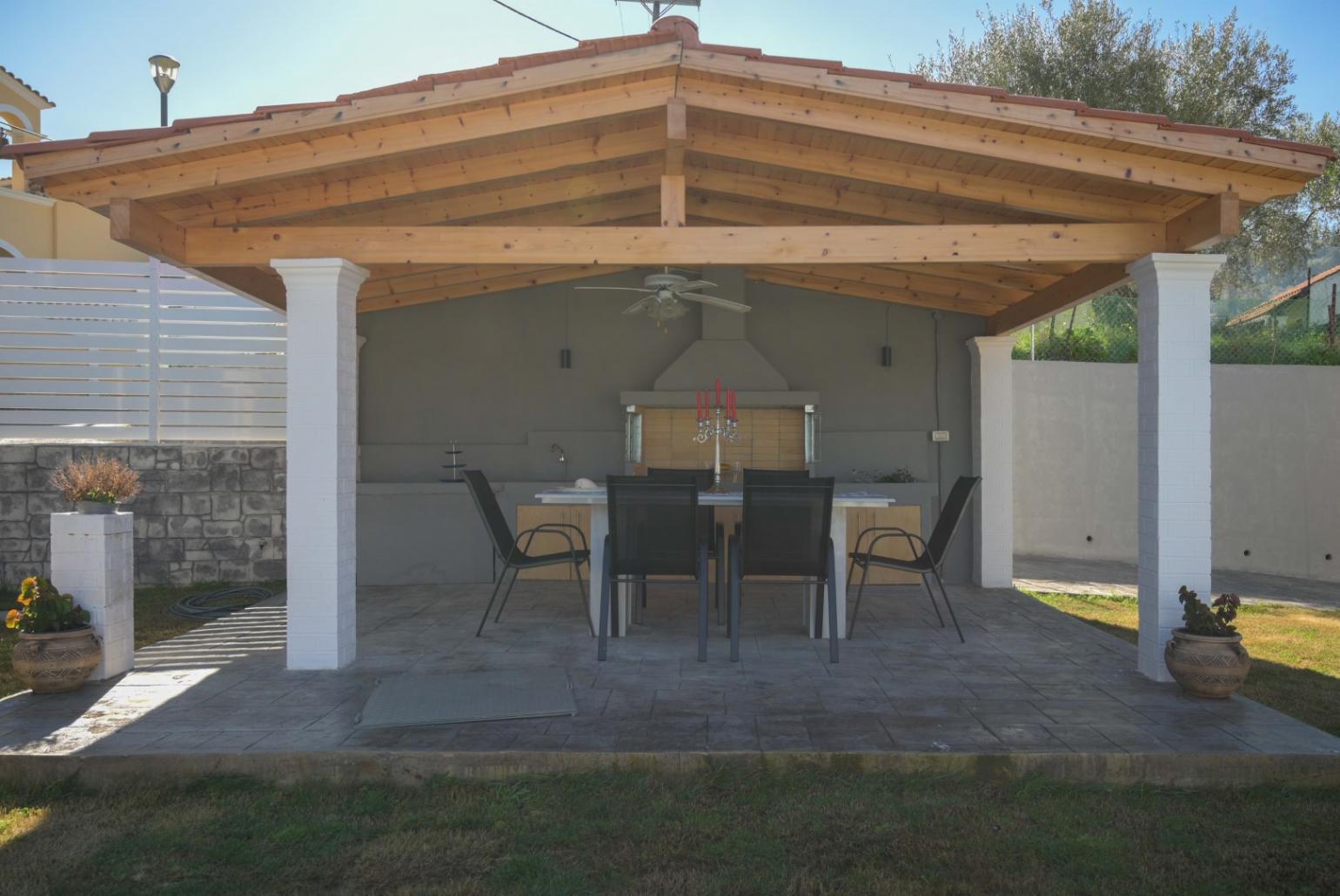 Outdoor kitchen, BBQ and dining table