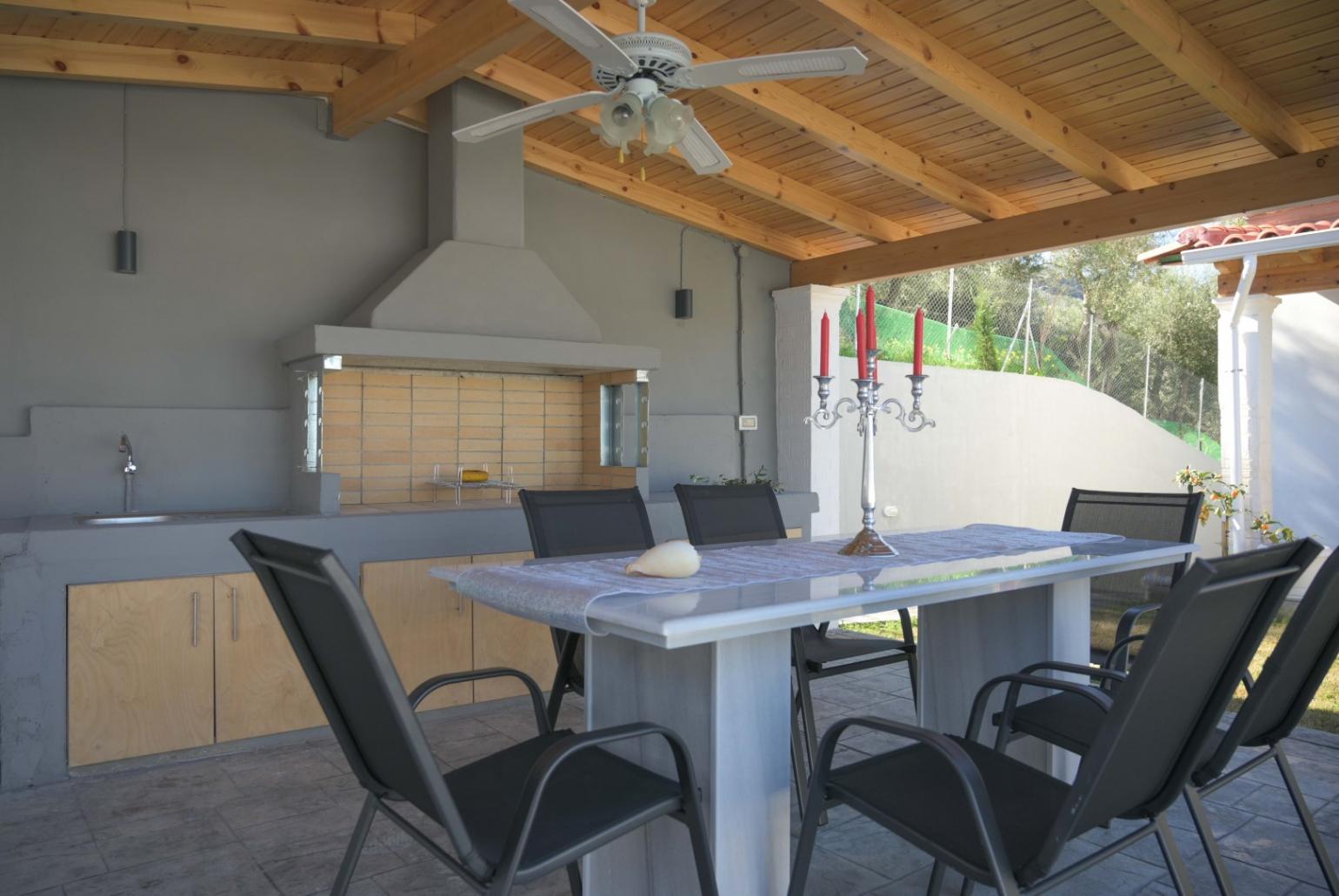 Outdoor kitchen, BBQ and dining table