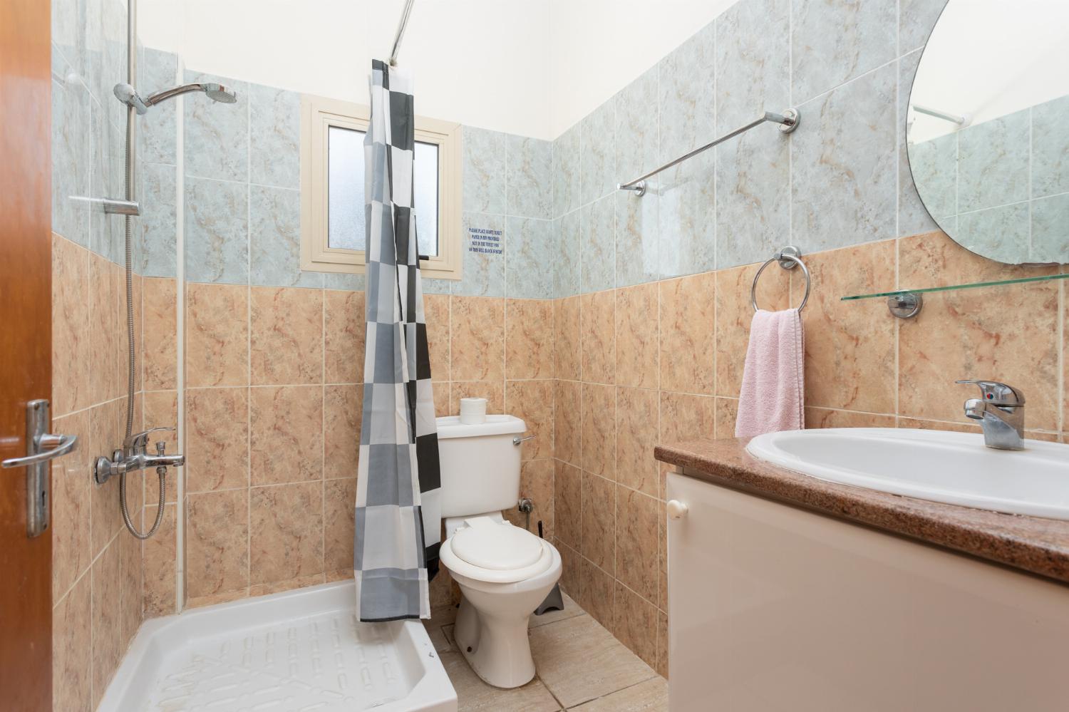 Family bathroom on ground floor with bath and shower