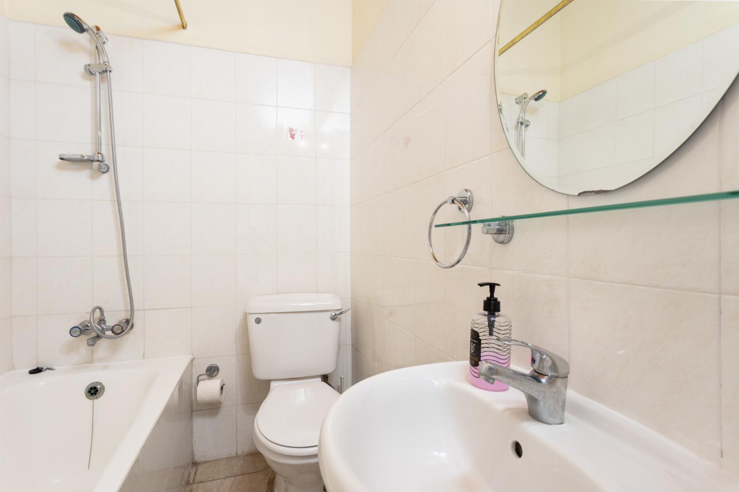 Family bathroom with bath and shower