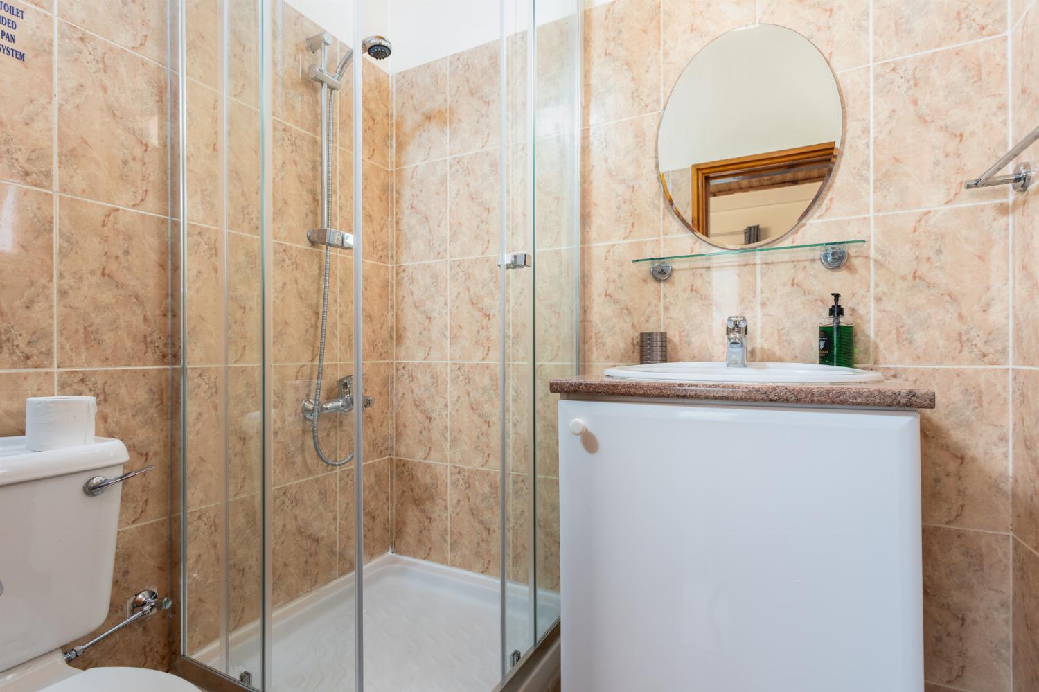 En suite bathroom with shower