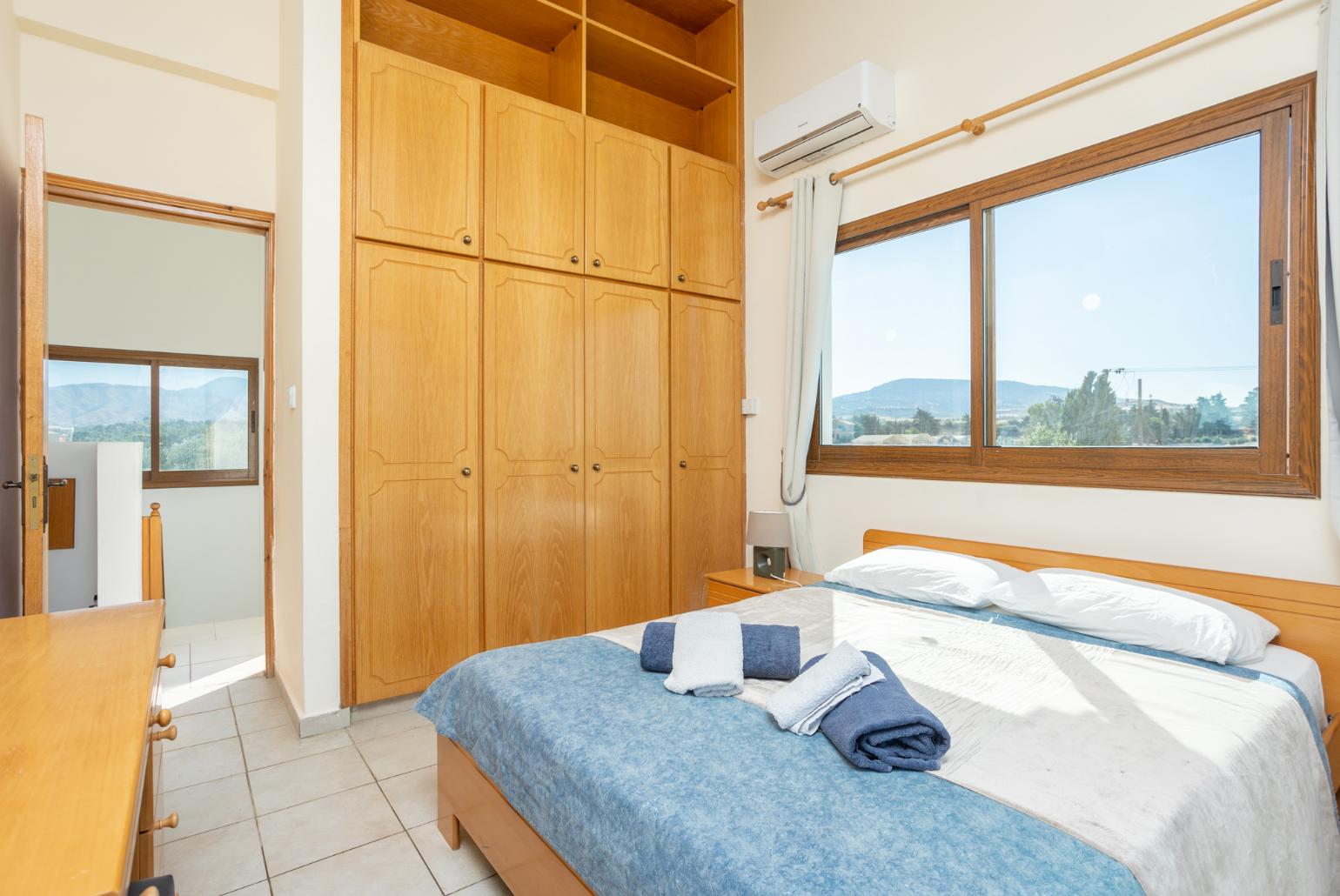 Double bedroom with A/C, sea views, and balcony access