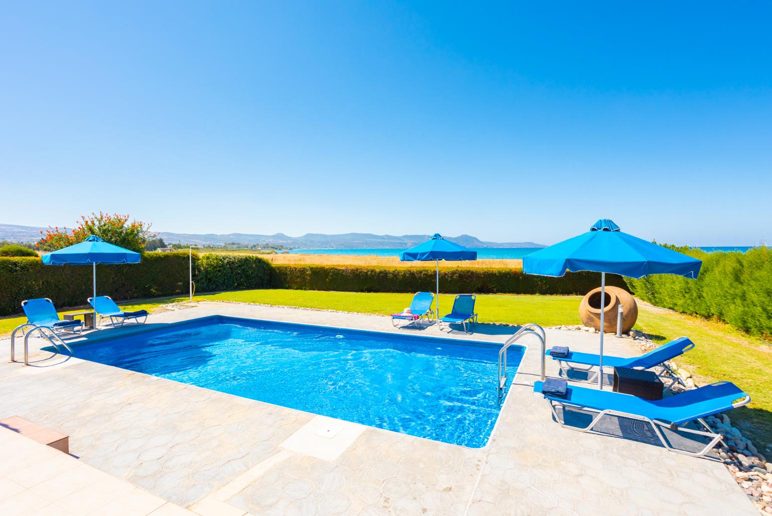 Private pool, terrace, and garden with sea views