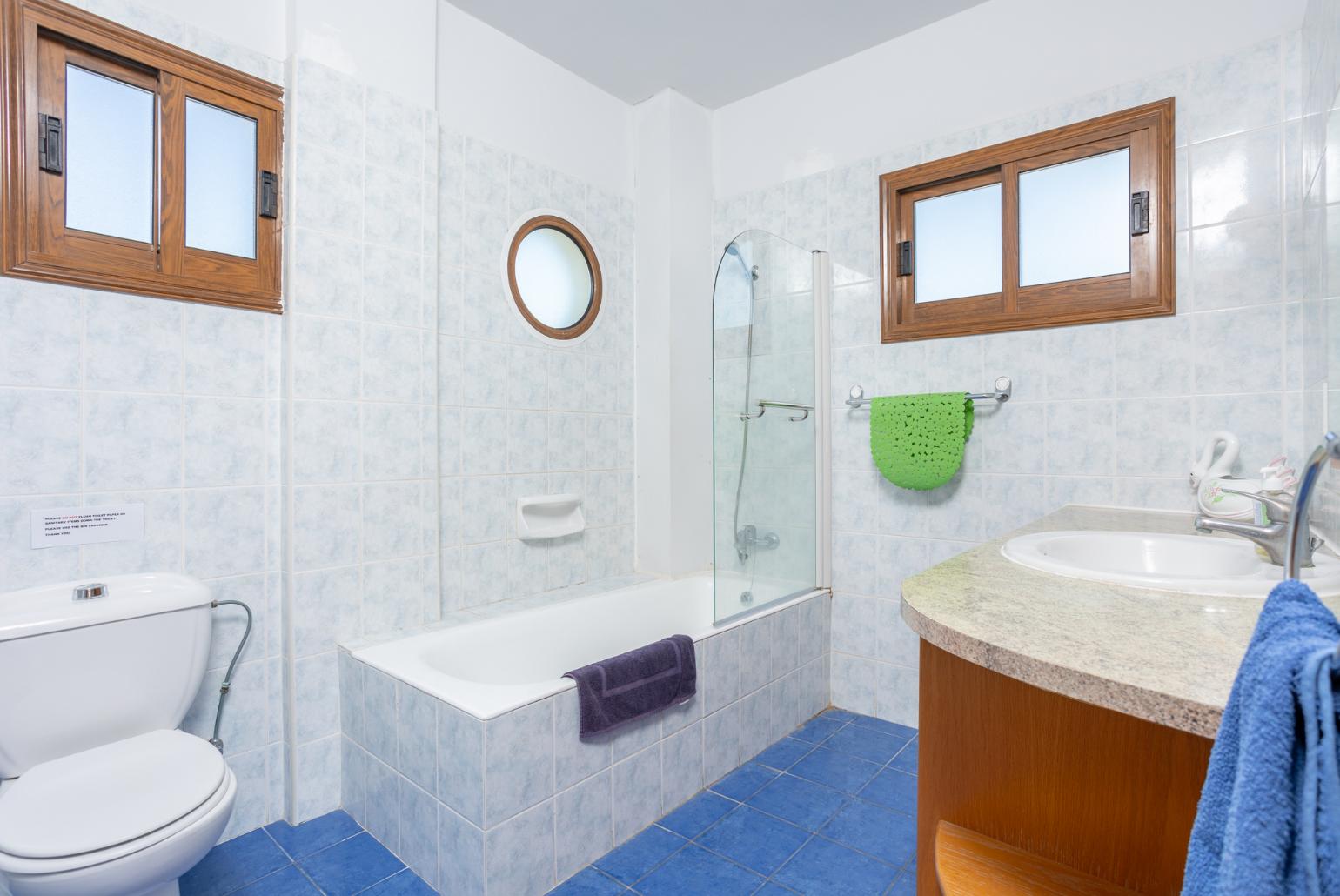 Family bathroom with bath and shower