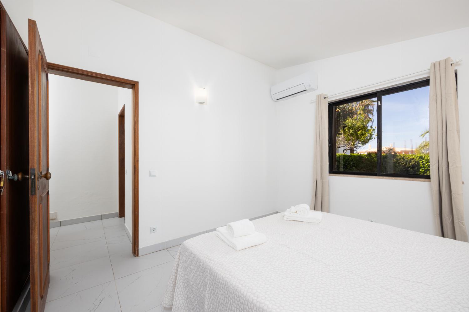 Double bedroom with en suite bathroom and A/C