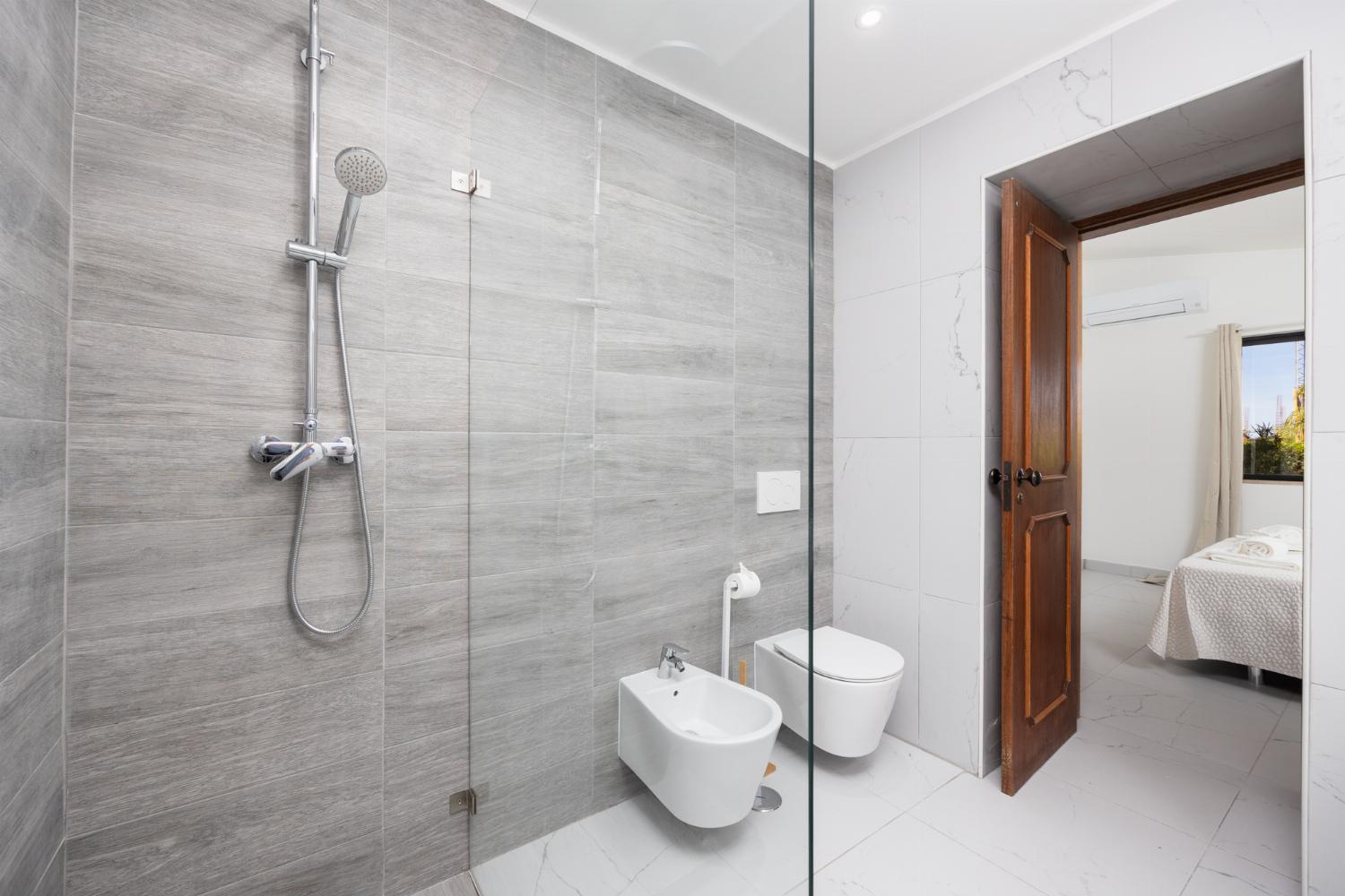 En suite bathroom with shower