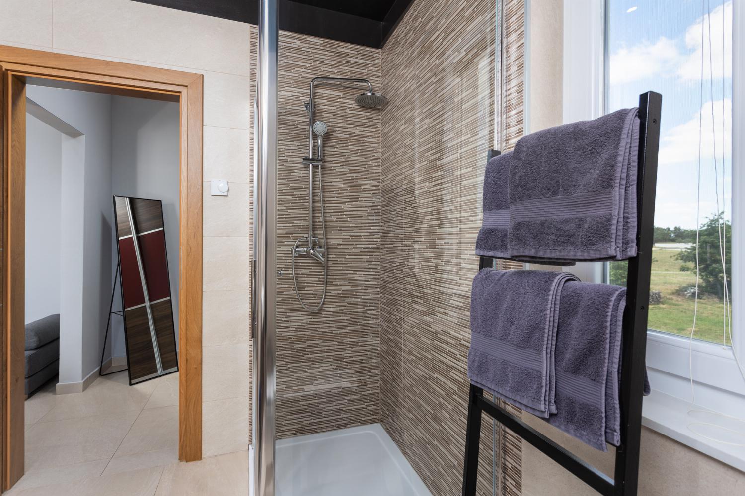 En suite bathroom with shower