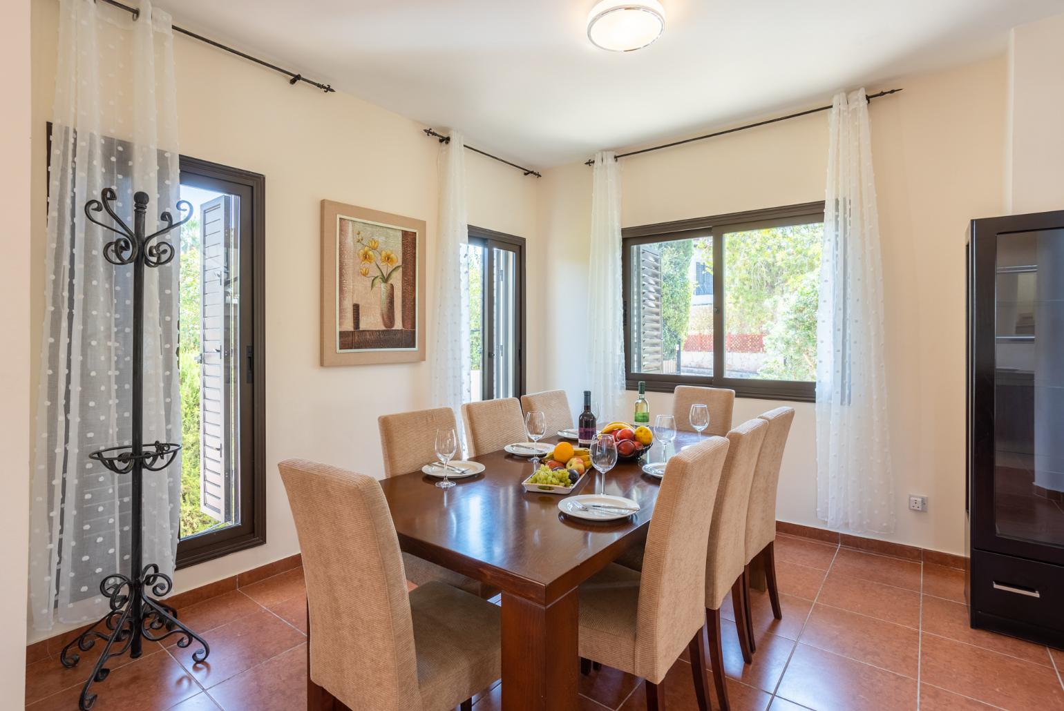 Living room with sofas, dining area, WiFi internet, and satellite TV