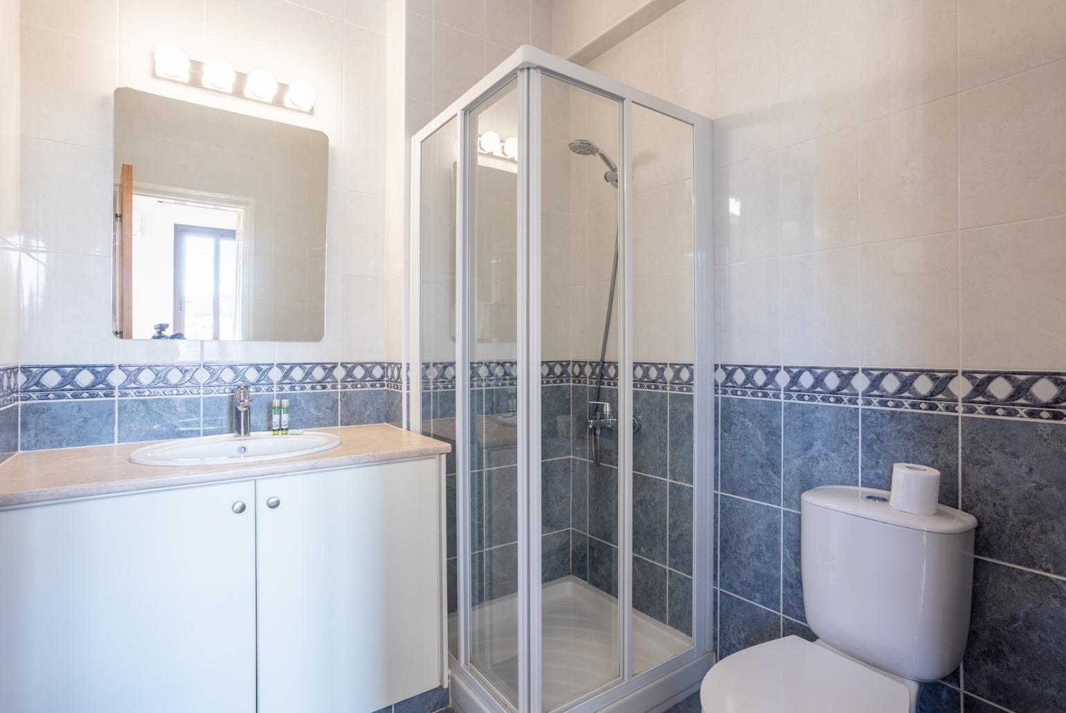 En suite bathroom with shower