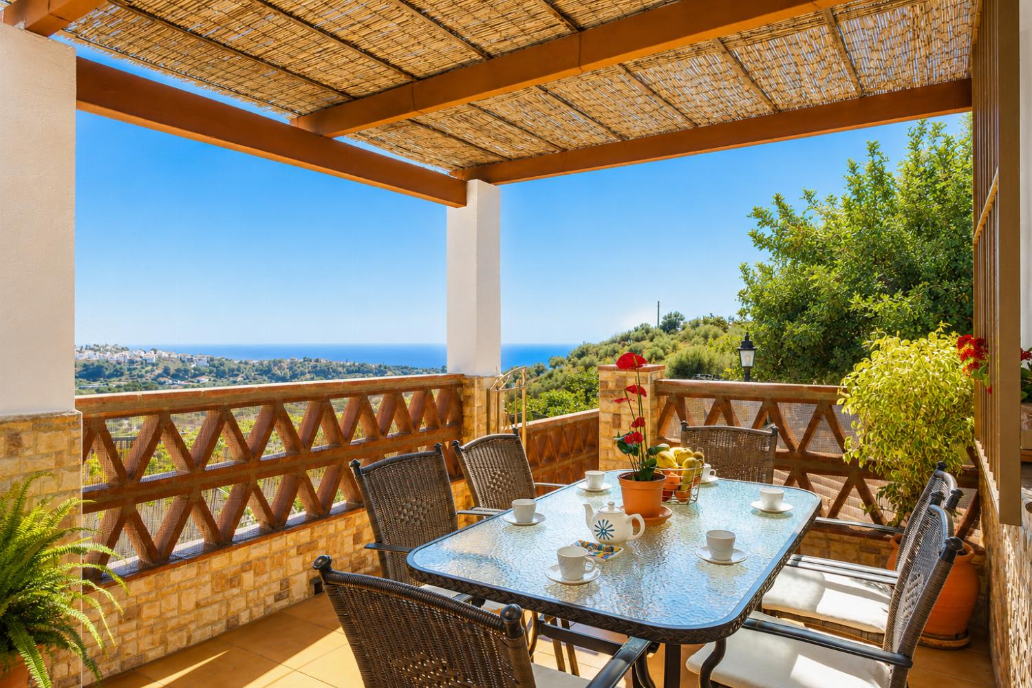 Sheltered terrace area with sea views