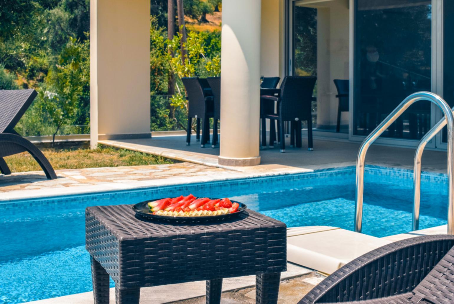 Private pool and terrace area with sea views