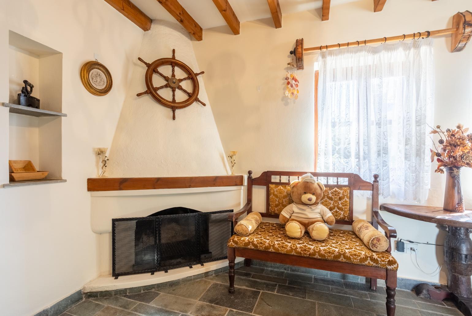 Living room with sofas, ornamental fireplace, WiFi internet, and satellite TV