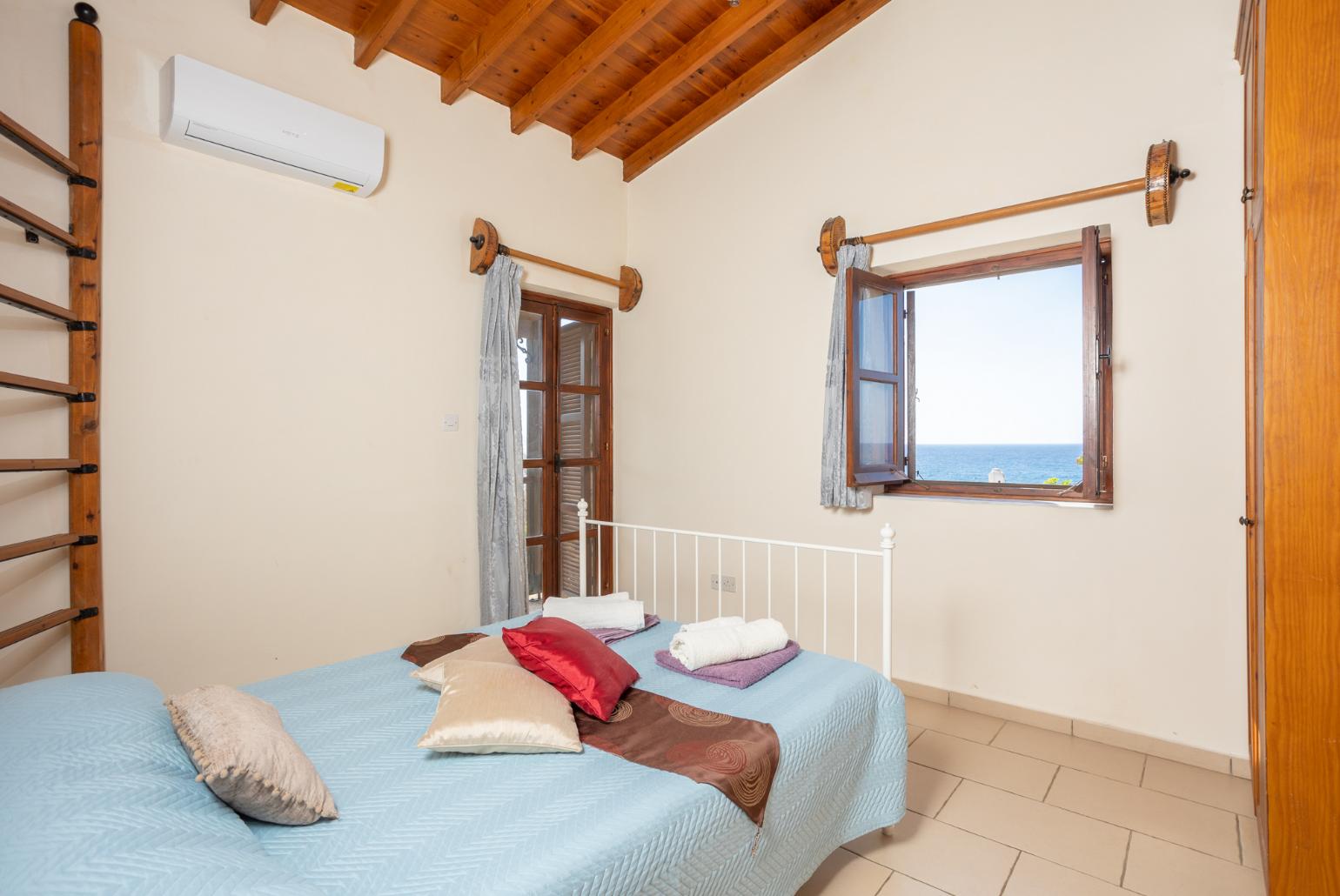 Double bedroom with A/C and sea views