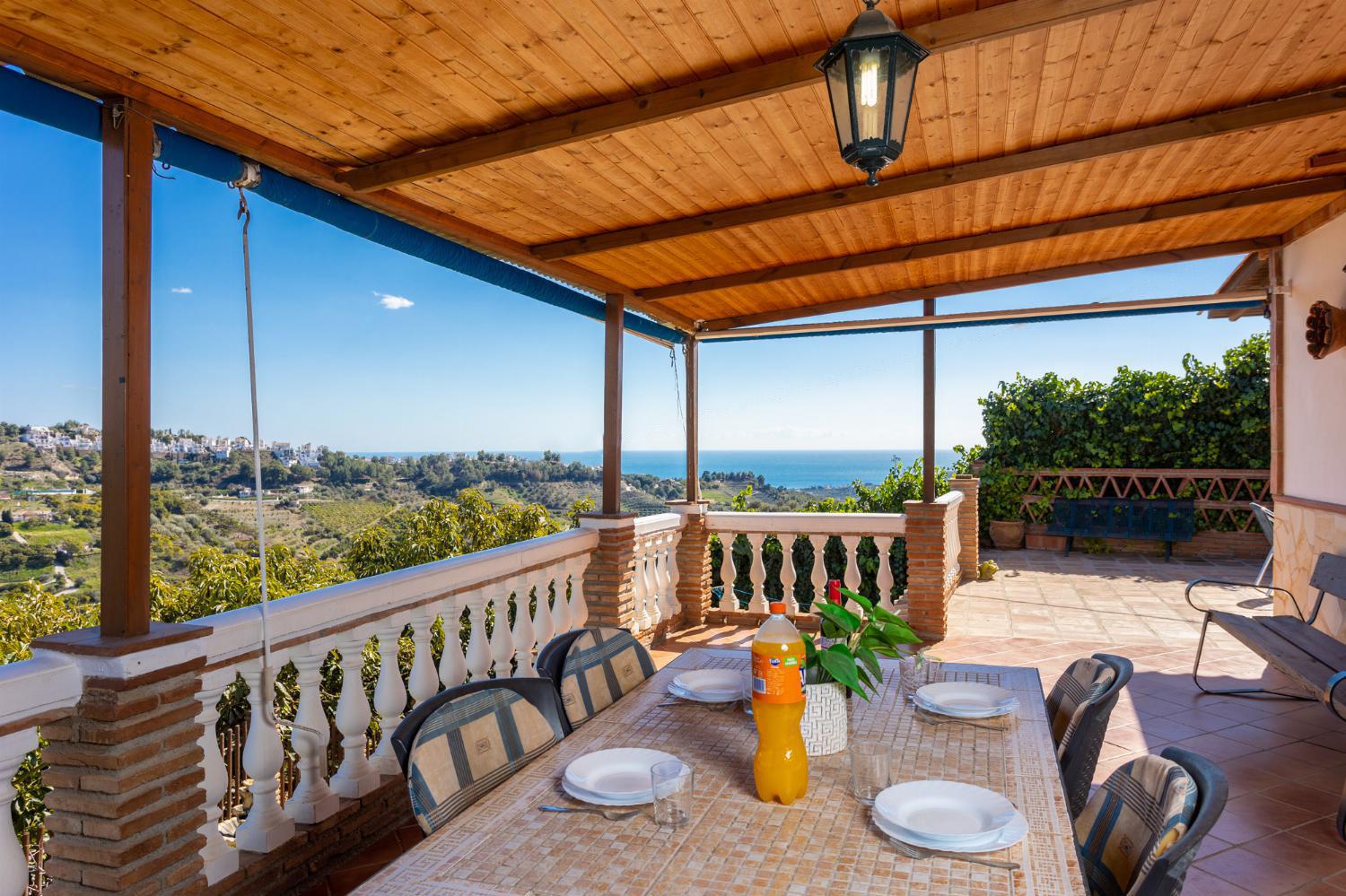 Sheltered terrace area with sea views