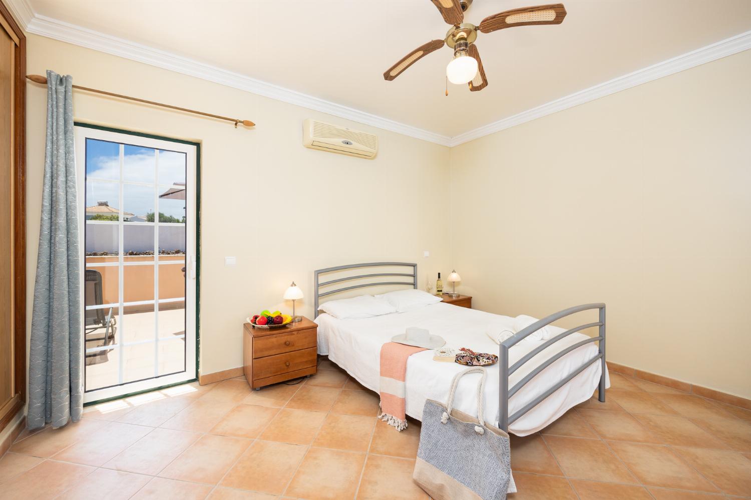 Double bedroom with en suite bathroom and A/C