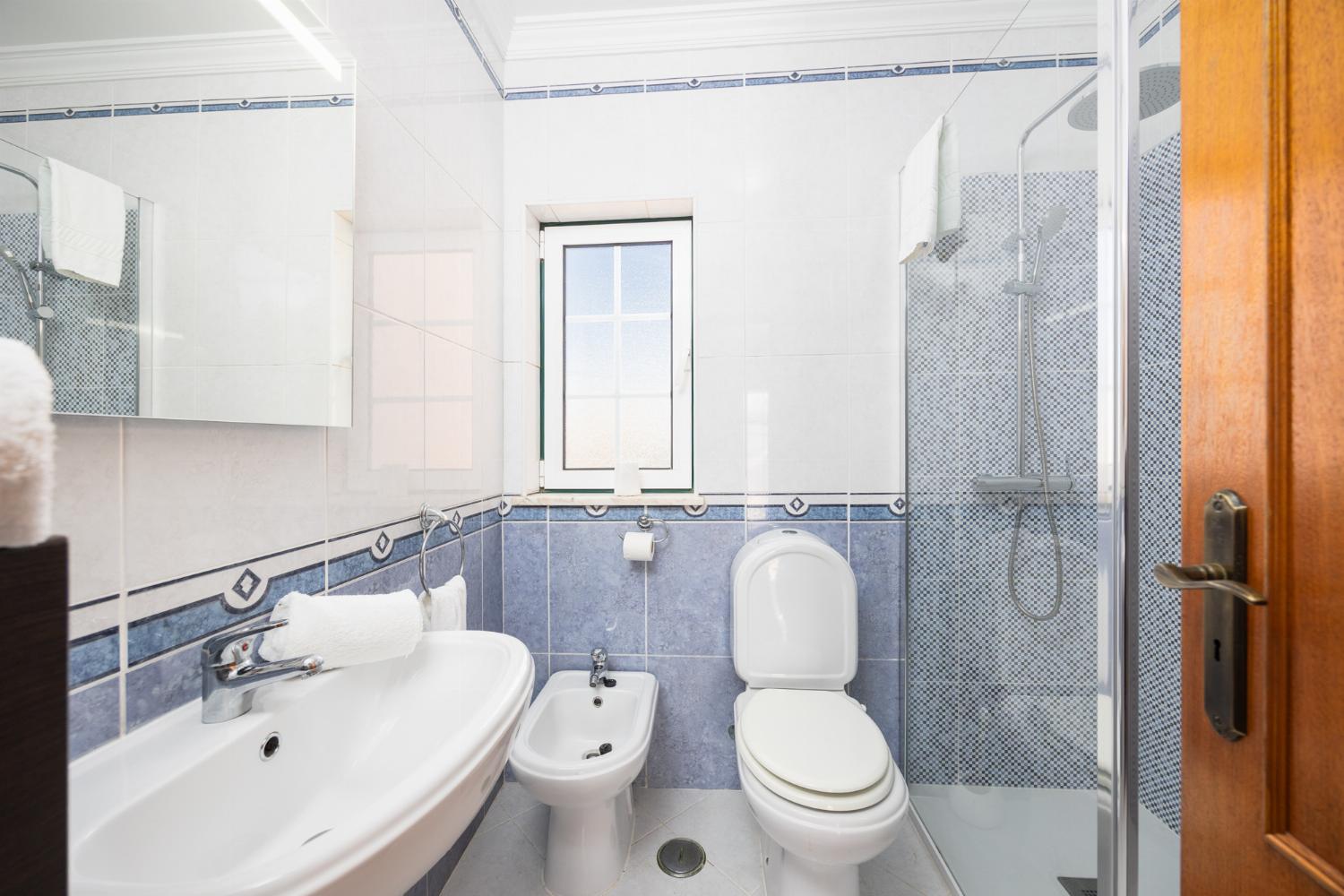 En suite bathroom with shower