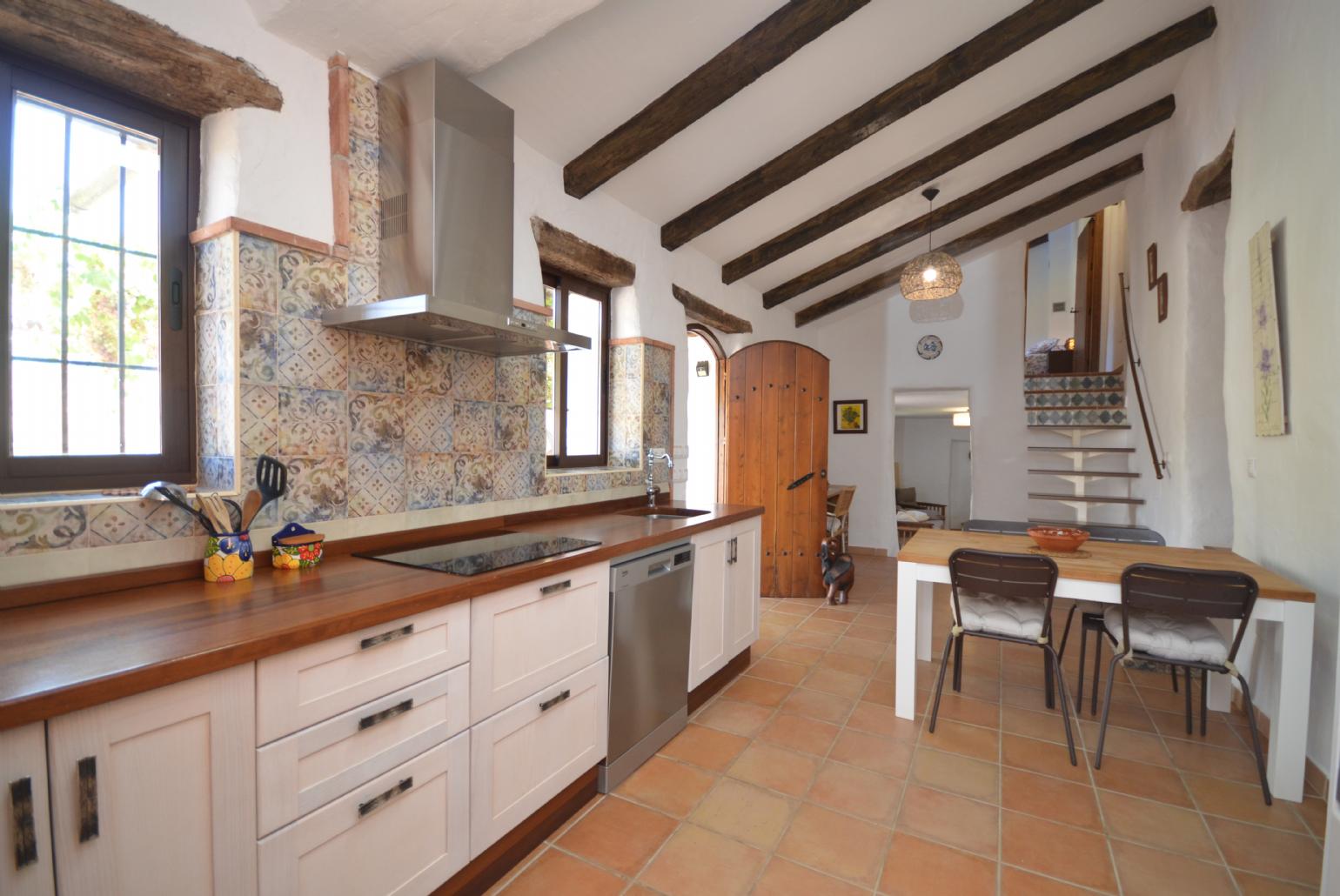 Equipped kitchen and dining area