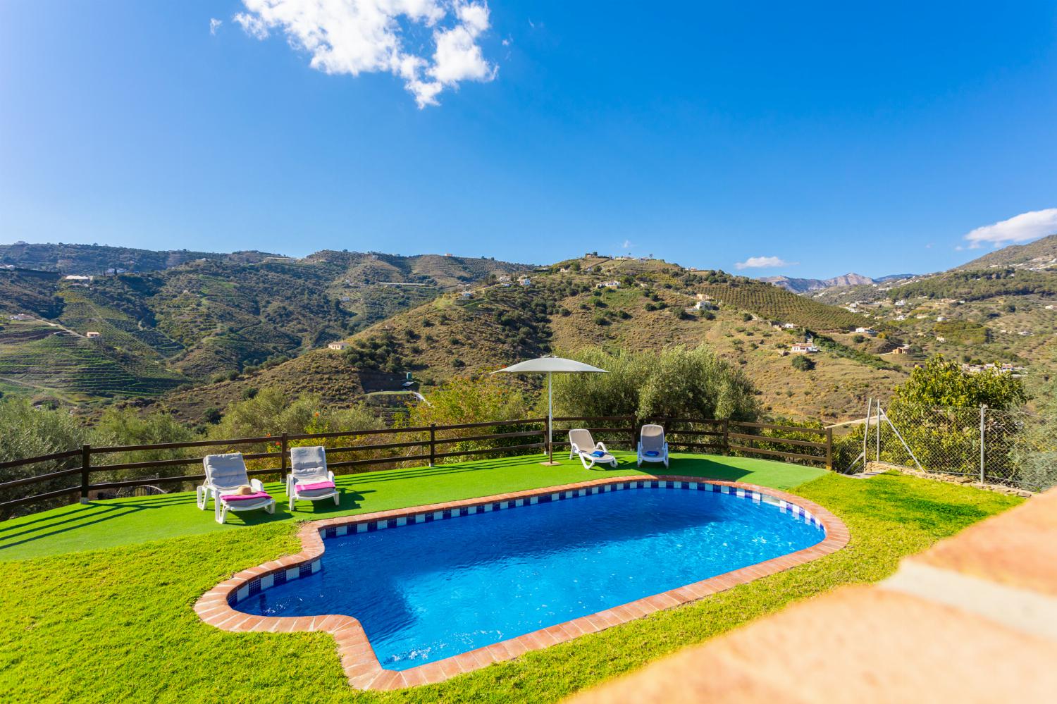 Private pool, terrace, and garden with countryside views