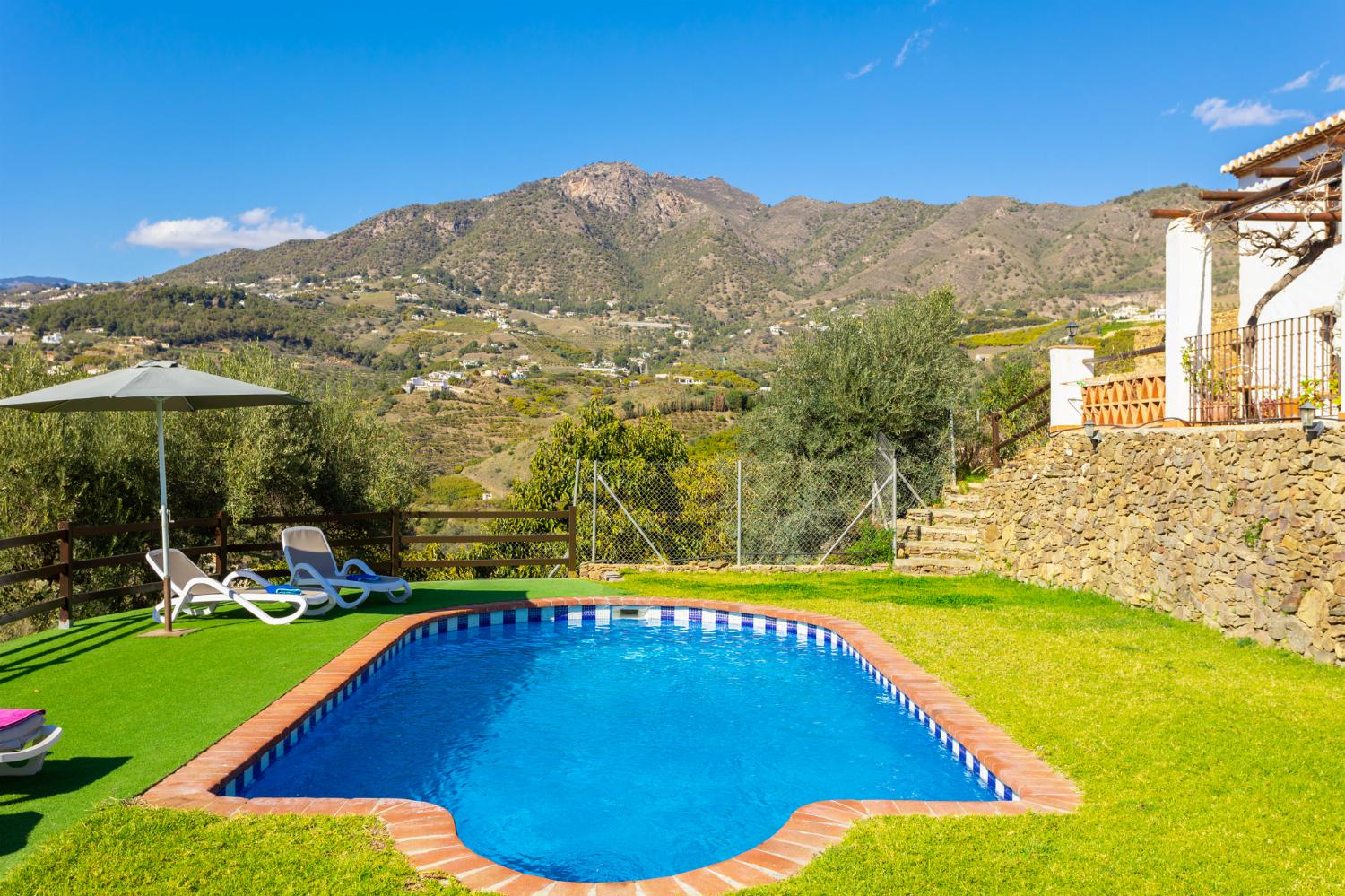Private pool, terrace, and garden with countryside views
