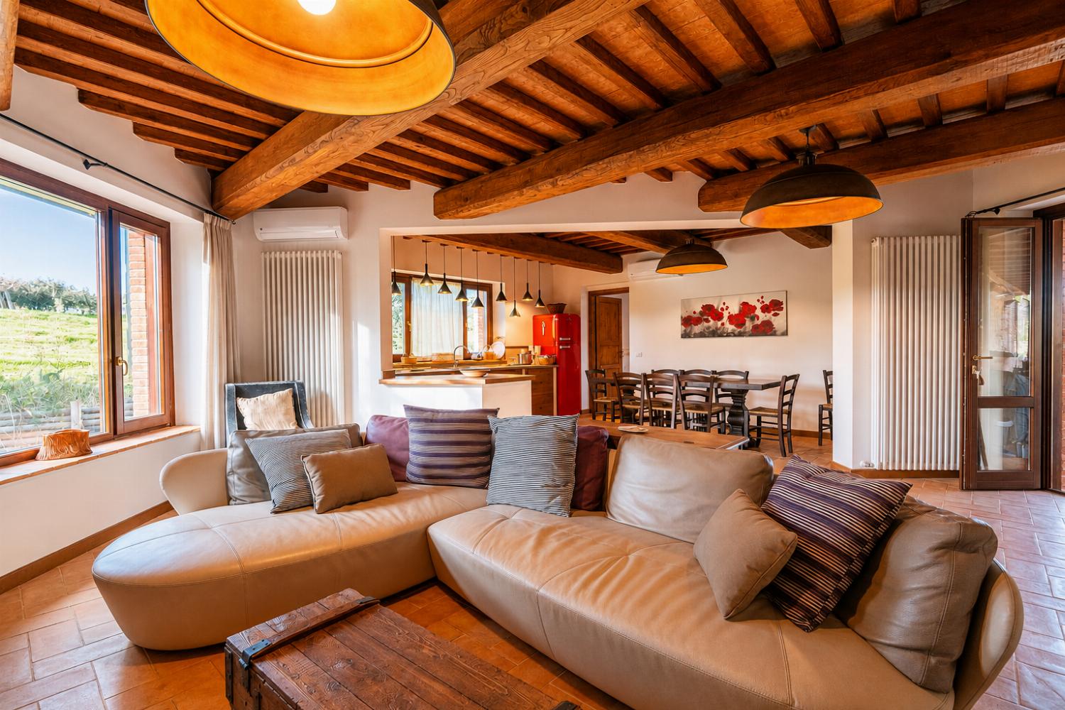 Living room with sofas, A/C, WiFi internet, and satellite TV