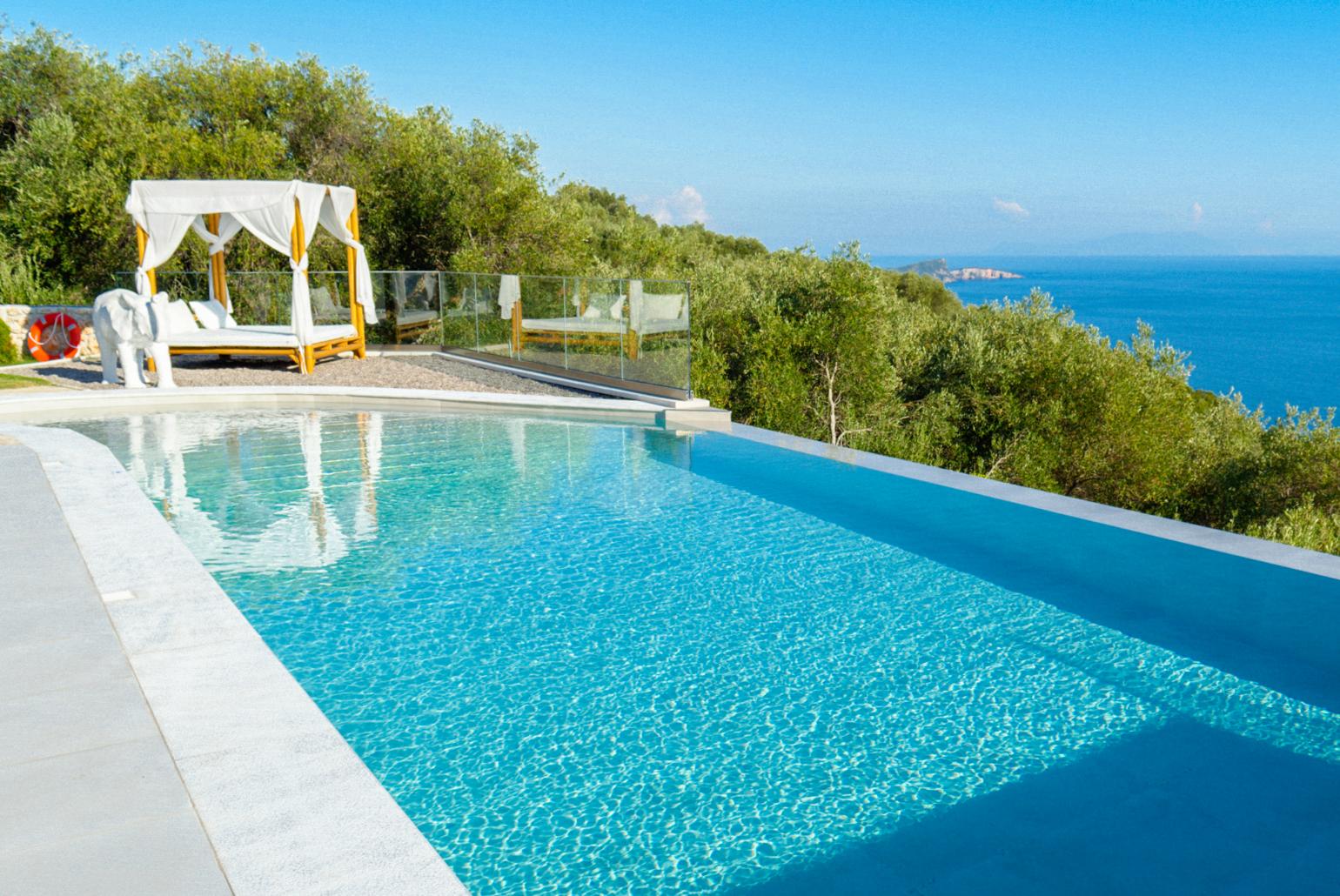 Private infinity pool and terrace with panoramic sea views