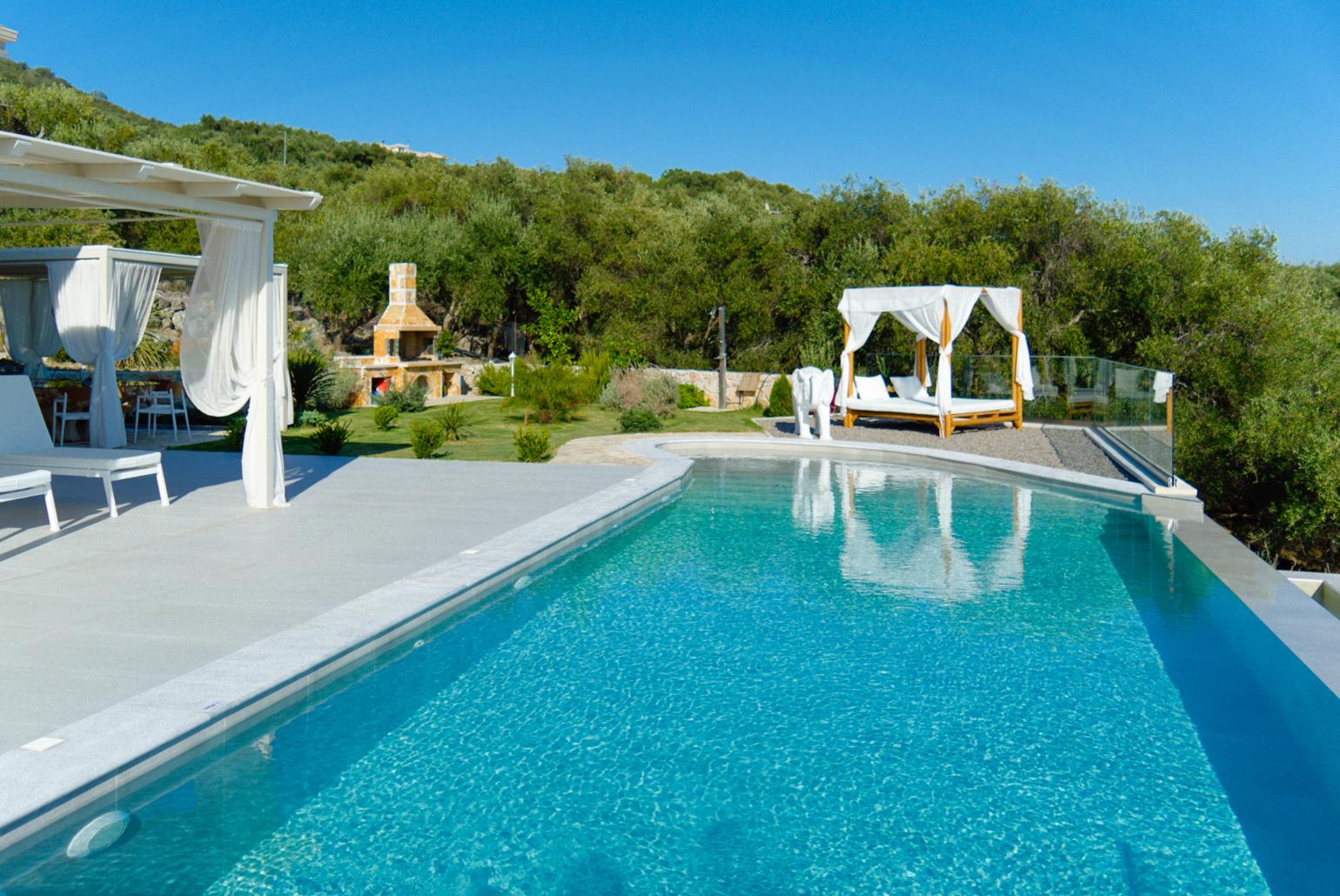 Private infinity pool and terrace with panoramic sea views