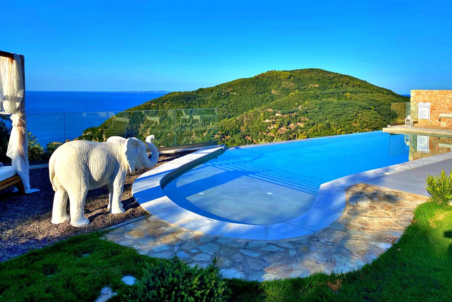 Private infinity pool and terrace with panoramic sea views