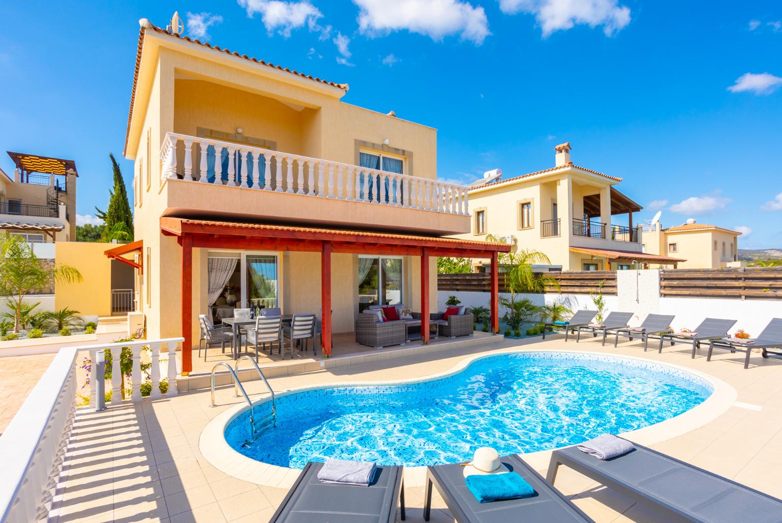 ,Beautiful villa with private pool, terrace, and garden with sea views