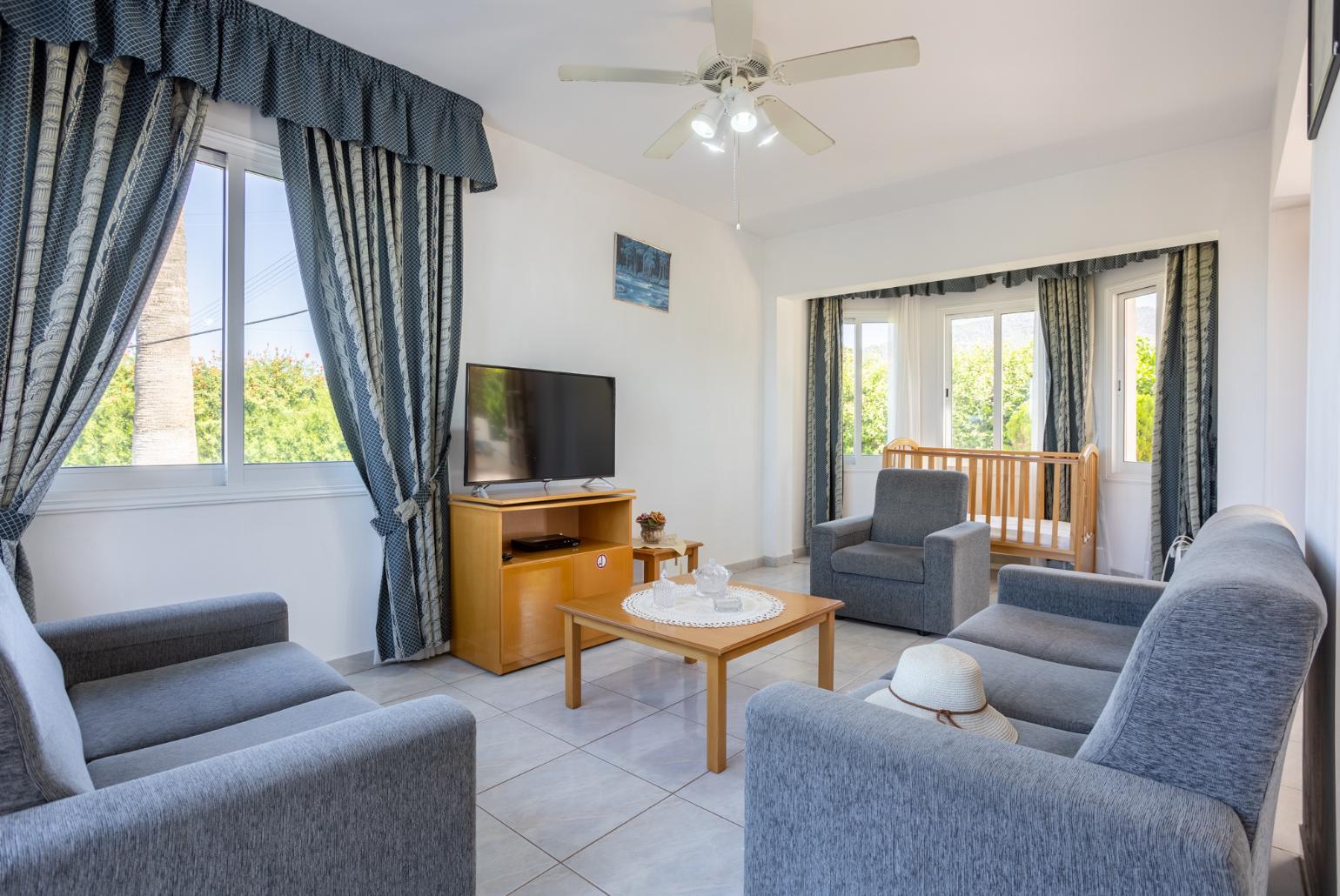 Living room with sofas, WiFi internet, and satellite TV